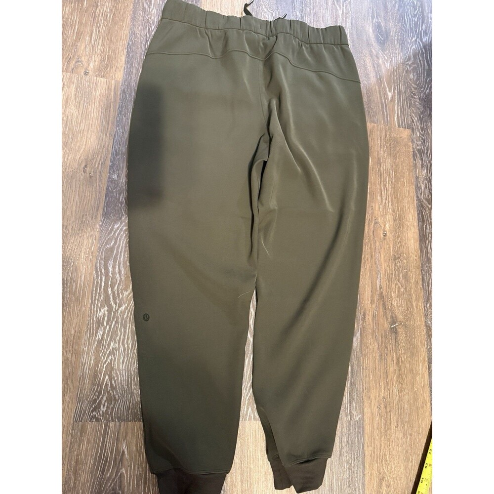 NWOT Lululemon On the Fly Jogger woven in Green Size 10 Dark Olive? - Picture 6 of 11